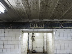 Mosaics above the former men's restroom