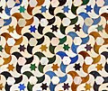 Wall tiling in the Alhambra, Spain (and the whole wall); ignoring all colors this is p3 (ignoring only star colors it is p1)