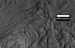 Close-up of fretted terrain near Reull Vallis, as seen by HiRISE. This area would be a challenge to walk across.