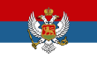 The flag of Montenegro (1905–1918), defaced with a Coat of arms