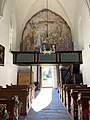Blick auf die Orgelempore; Westwand mit der Darstellung der Kreuzigung Jesu
