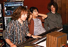 Three men at a mixing board