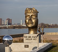 very large sculpture of Nellie Bly's head