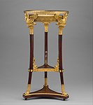 Washstand (athénienne or lavabo); 1800–1814; legs, base and shelf of yew wood, gilt-bronze mounts, iron plate beneath shelf; height: 92.4 cm, width: 49.5 cm; Metropolitan Museum of Art (New York City)