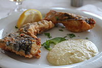 Salted cod with garlic sauce, a traditional Greek dish for the day of the Annunciation,[15] served at a Greek restaurant