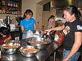 Helenes are active members of the LA community: here they prepare a warm meal for those in need.