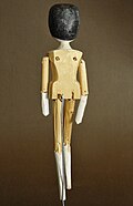 Peg wooden doll from Val Gardena, late 19th century, rear view