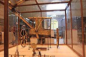 A chariot, reassembled from the pieces in the antechamber