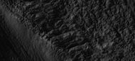 Close-up of the edge of one of the glaciers on the bottom of the wide view from a previous image Picture was taken by HiRISE under the HiWish program.
