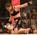 Image 24Gina Carano applying a ground-and-pound on her opponent. (from Mixed martial arts)