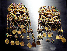 The treasure of the royal burial at Tillya Tepe is attributed to first-century BCE Saka in Bactria.
