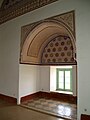 Interior of the pavilion, with stucco decoration around a window