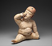 Seated figurine; 12th–9th century BC; painted ceramic; height: 34 cm, width: 31.8 cm, depth: 14.6 cm; Metropolitan Museum of Art (New York City)