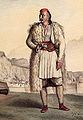 A hand-coloured lithograph by Louis Dupré in his travel book, Voyage à Athènes et à Constantinople, 1820s. Depicted here is a Souliote warrior of the Greek Legion in Corfu.