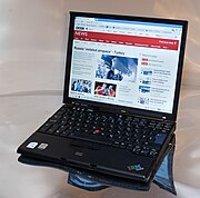 A photograph showing an open Lenovo ThinkPad X60s