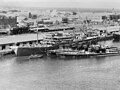 The submarine tender USS Holland with five American submarines at Fremantle submarine base in 1942