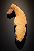 A stone sculpture of a dog that resembles the ancient native Saluki breed, dating back to 8100 BC.