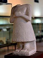 Headless statue, the name of the deity Ninshubur is mentioned on the right shoulder. From Adab. 2600-2370 BCE. Iraq Museum