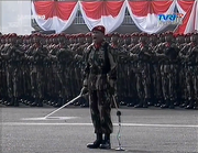 Present arms by Kopassus during a military parade