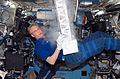 NASA Image: S116E07446: European Space Agency (ESA) astronaut Thomas Reiter, STS-116 mission specialist, works with the Passive Observatories for Experimental Microbial Systems in Micro-G (POEMS) payload in the Minus Eighty Degree Laboratory Freezer for ISS (MELFI) in the Destiny laboratory of the International Space Station while Space Shuttle Discovery was docked with the station.