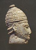 Head of a warrior; 1300-1200 BC; ivory; height: 8 cm; National Archaeological Museum (Athens)[16]