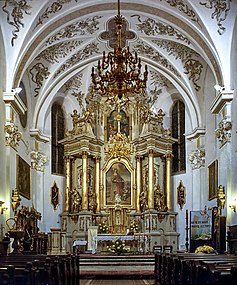The Baroque altarpiece at St Nicolaus Basilica, Bochnia, Poland.