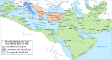 Map of western Eurasia and northern Africa showing the Caliphate in green covering most of the Middle East, with the Byzantine Empire outlined in orange and the Lombard principalities in blue