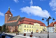 Town Hall and Our Lady of Częstochowa Church in Darłowo