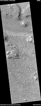 Wide view of layered terrain, as seen by HiRISE under HiWish program. Location is northeast of Gale Crater.