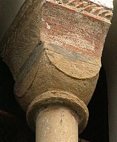 Capital of convex cubic form with its abacus, concave dosseret and cable decoration defined by polychrome. Herina. Capitals of this shape are often decorated with "Barbaric" carvings of foliage, and mythical creatures.
