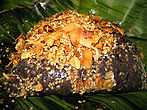 Htamanè - glutinous rice with fried coconut, roasted peanuts, sesame and ginger