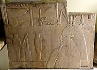 Limestone slab showing the Nile God Hapi. 12th Dynasty. From the foundations of the temple of Thutmose III at Koptos, Egypt. Petrie Museum of Egyptian Archaeology, London