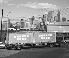 In 1975, many containers still featured riveted aluminum sheet-and-post wall construction, instead of welded, corrugated steel.[11]