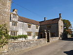 Midelney Manor, forecourt and garden walling with gate piers