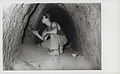 A Marine explores a Viet Cong tunnel complex found by 2/26 Marines