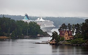 Cruise ship in the Oxdjupet strait, with Hästholmen to right