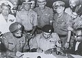 Image 43Pakistan Army General A. A. K. Niazi signing surrender agreement before Sh. Jagjit Singh Aurora of Indian Army after getting defeated in the 1971 Bangladesh Liberation War against East Pakistan, which eventually liberated as Bangladesh later. (from 1970s)