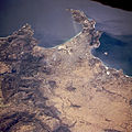 Cape Town from space, looking south over False Bay with Hangklip Point (top left), Cape Point (top right) and Table Bay south and east of the clearly visible, circular Robben Island, February 1995.