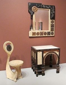 Snail chair and other furniture by Carlo Bugatti (1902)