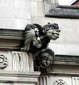Grotesque by Nathaniel Hitch on exterior of 2 Temple Place, London