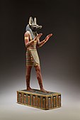 Statuette of Anubis; 332–30 BC; plastered and painted wood; 42.3 cm; Metropolitan Museum of Art