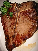 A griddle-cooked T-bone steak at Gorat's