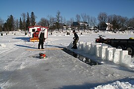 Fishing hole and cut ice blocks