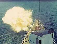 USCG Cook Inlet conducts fire support off the coast of Vietnam in 1971.