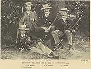 Team photograph of a rifle shooting team, in black and white.