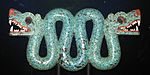 Double-headed serpent (Aztec); c. 1450–1521; cedar, turquoise, shell and traces of gilding; length: 43.3 cm; British Museum[64]