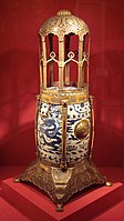 Chinese porcelain stool (1575-1600) with Ottoman metallic mounting and modifications (1618) for use as an incense burner Turkish and Islamic Arts Museum.