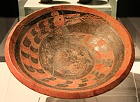 Painted Pottery Plate with Dragon Design Taosi Culture, Early Period (2,300—2,100 BCE) Excavated at the Taosi Site, Xiangfen County, Shanxi. Capital Museum, Beijing.