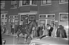 Police on horseback keep order during the riots, 1972