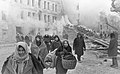 Image 49Residents of Leningrad leave their homes destroyed by German bombing. About 1 million civilians died during the 871-day Siege of Leningrad, mostly from starvation. (from Soviet Union)